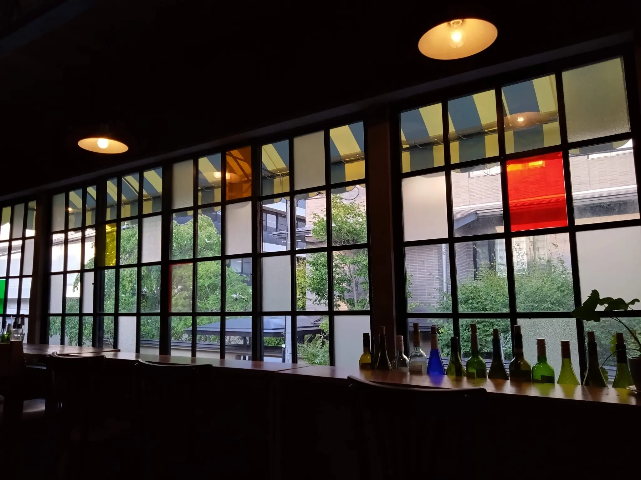 Colored glass windows at Kamo River Cafe in Kyoto